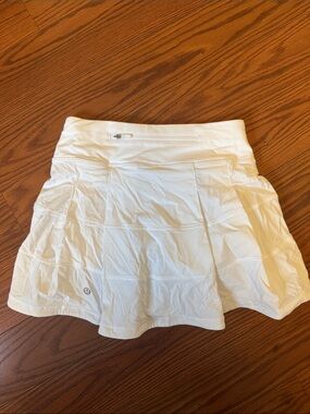 White Lululemon tennis/golf skirt with shots attached